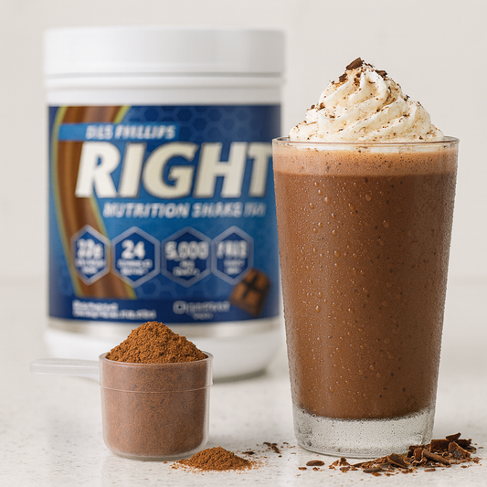 Chocolate protein shake with a container of Phillips Right Nutrition Shakes mix on a white background